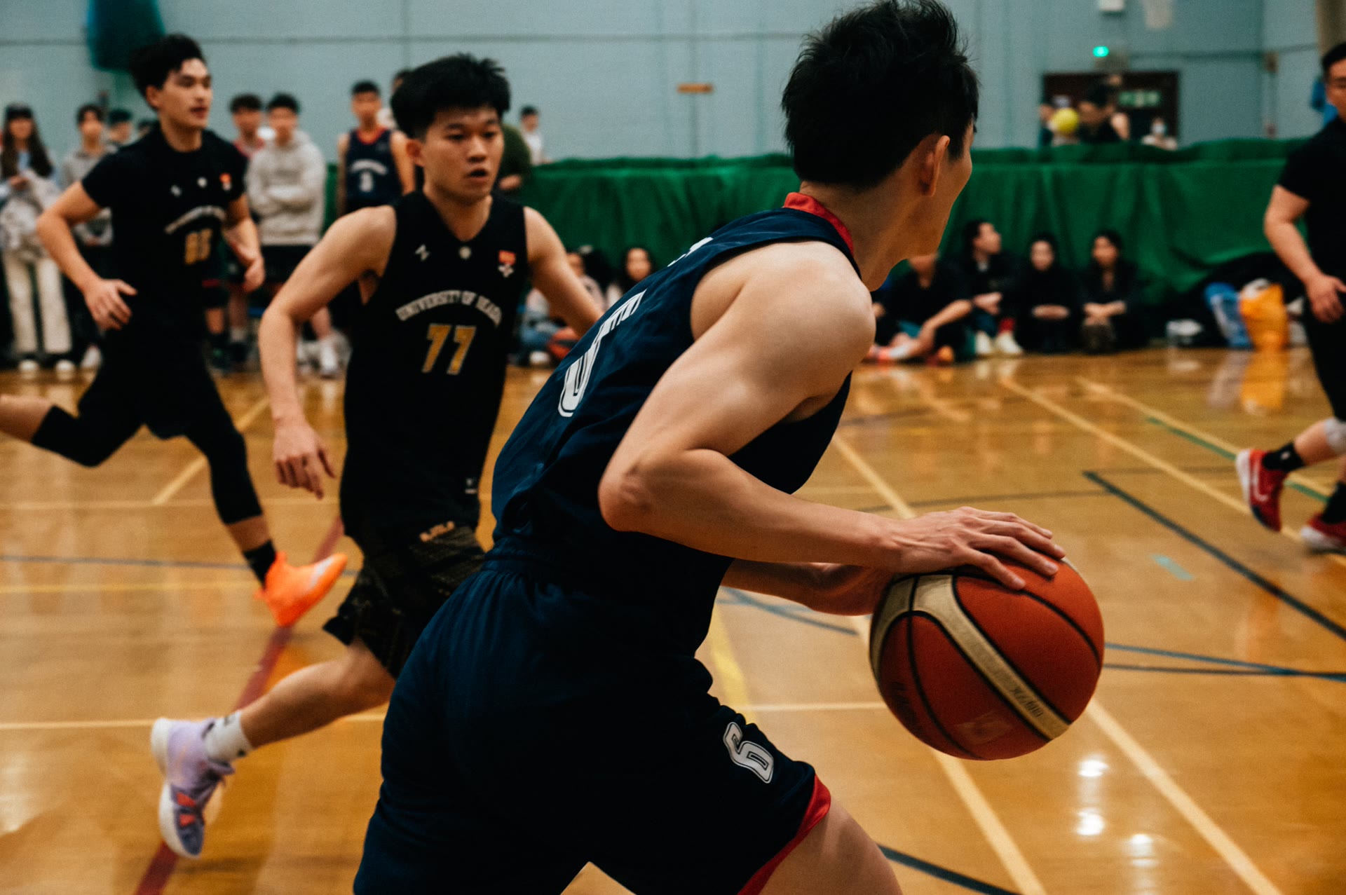 Player driving to the basket in a game